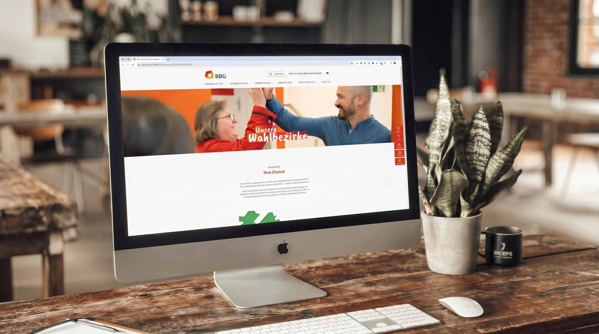 Ein Desktop-Monitor zeigt die Vertreterwahlseite der Website der Braunschweiger Baugenossenschaft, die BICEPS als Webdesign-Projekt umgesetzt hat.